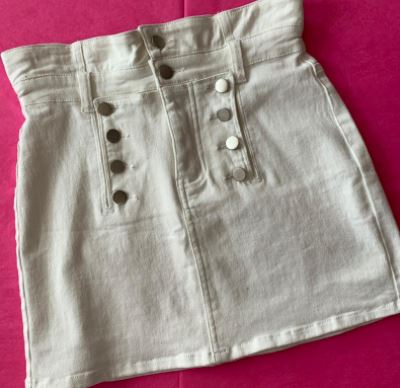 White skirt with silver buttons