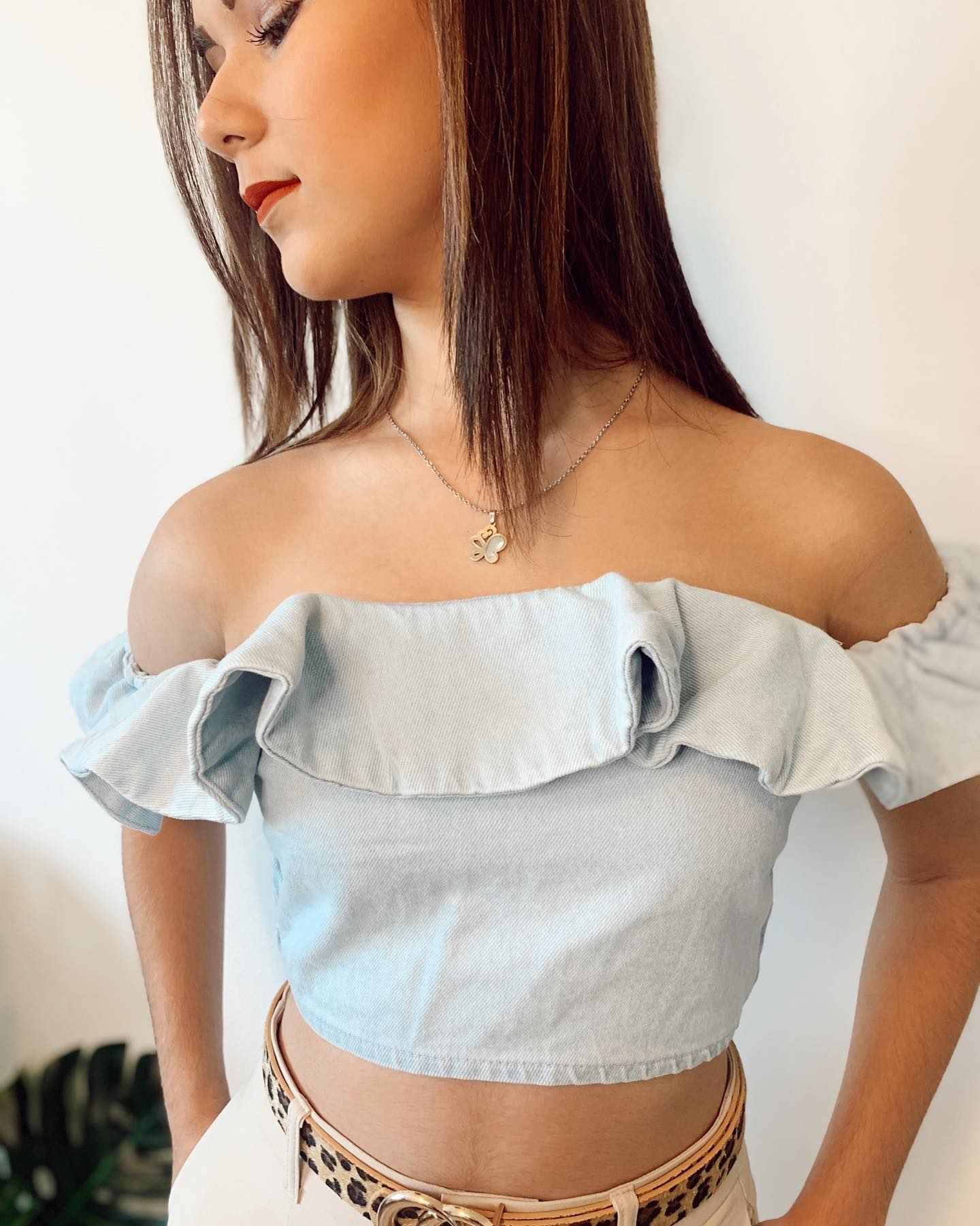 Off shoulder ruffled denim top